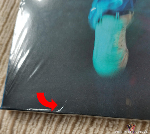 Karol G ‎– KG0516 vinyl record front cover bottom seam