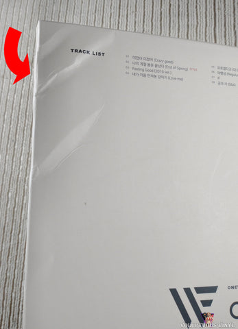 ONEWE ‎– ONE CD back cover top left corner section