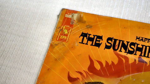 The Sunshine Company – Happy Is vinyl record front cover top left corner