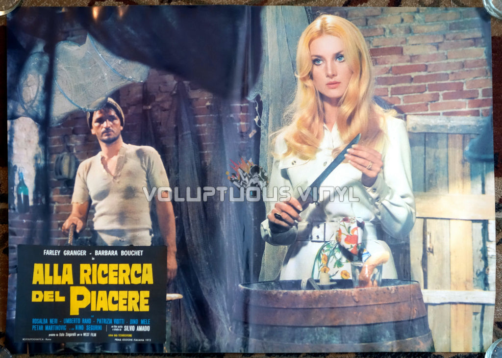 Barbara Bouchet with a knife in Amuck
