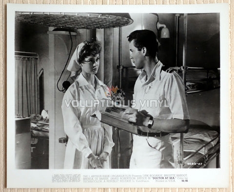 Brigitte Bardot dressed as a nurse with Dirk Bogarde in the film Doctor At Sea