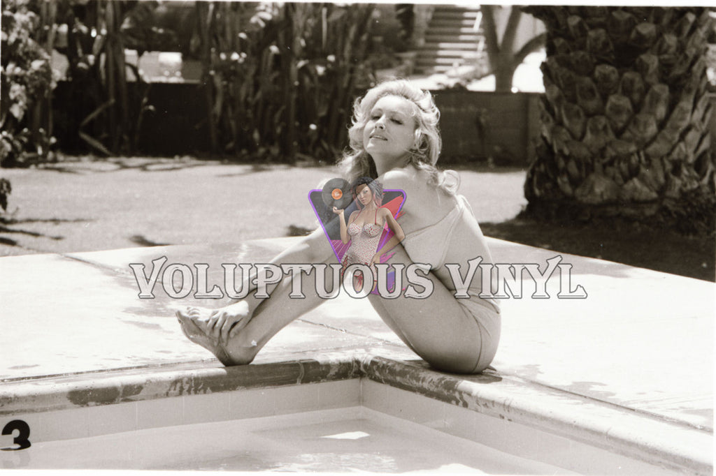 Julie Newmar sunbathing poolside in bikini 1960s photo negative