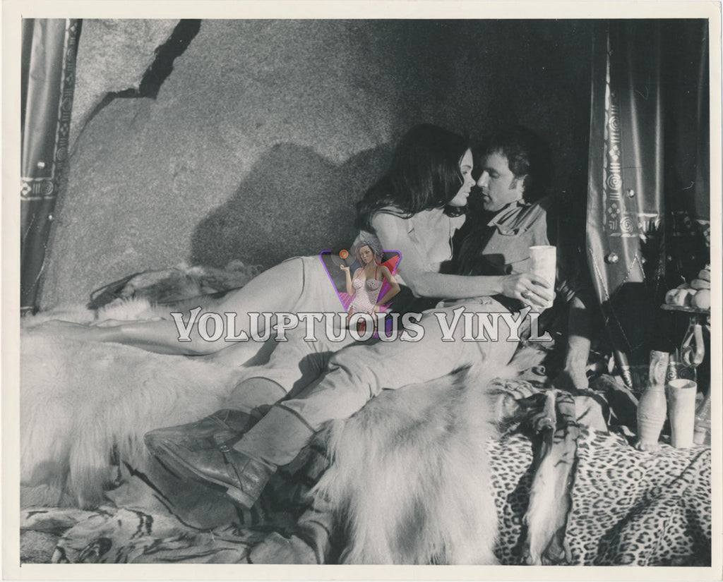 Martine Beswick Seducing Michael Latimer In Prehistoric Women photograph